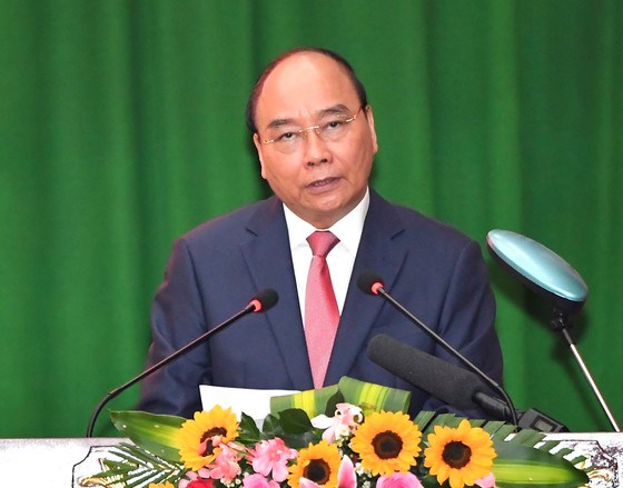 Chủ tịch nước Nguyễn Xu&acirc;n Ph&uacute;c ph&aacute;t biểu tại buổi đến thăm, ch&uacute;c tết C&ocirc;ng an TPHCM, s&aacute;ng 24-1-2022. Ảnh: VIỆT DŨNG