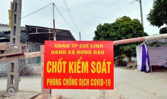 S&#225;ng nay Việt Nam ghi nhận th&#234;m 4 ca mắc mới Covid-19 trong cộng đồng - Ảnh 1