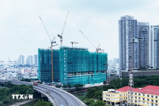 Chung cư đang xây dựng ở quận 7 (Thành phố Hồ Chí Minh). (Ảnh minh họa: Hồng Đạt/TTXVN)