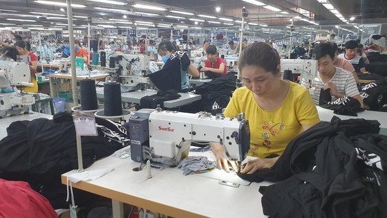 Hoạt động sản xuất tại C&ocirc;ng ty TNHH Fly High Garment (quận G&ograve; Vấp, TPHCM)