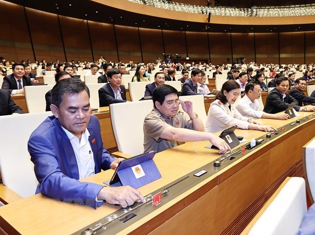 C&aacute;c đại biểu Quốc hội biểu quyết th&ocirc;ng qua Luật Ph&ograve;ng, chống ma t&uacute;y (sửa đổi). (Ảnh: TTXVN)