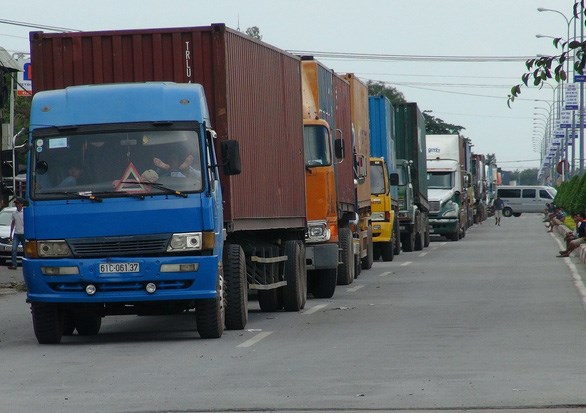 C&aacute;c xe tải đi qua cửa khẩu quốc tế Mộc B&agrave;i (T&acirc;y Ninh) - Ảnh: Tuấn Anh
