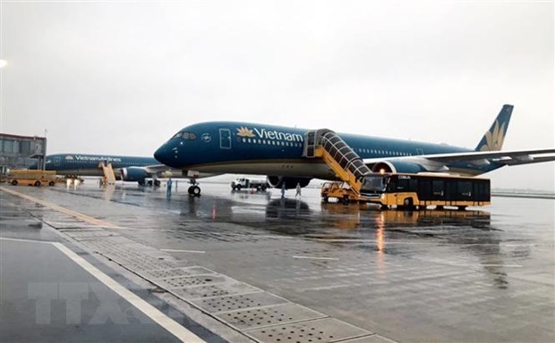 M&aacute;y bay Vietnam Airlines tại s&acirc;n bay V&acirc;n Đồn. (Ảnh minh họa: TTXVN ph&aacute;t)