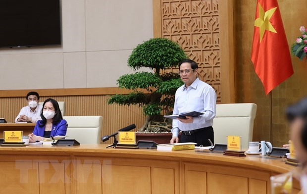Thủ tướng Phạm Minh Ch&iacute;nh chủ tr&igrave; phi&ecirc;n họp. &nbsp;(Ảnh: Dương Giang/TTXVN)