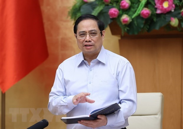 Thủ tướng Phạm Minh Ch&iacute;nh chủ tr&igrave; phi&ecirc;n họp. (Ảnh: Dương Giang/TTXVN)