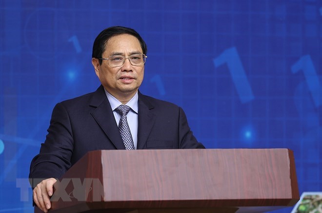 Thủ tướng Phạm Minh Chính phát biểu khai mạc Diễn đàn Kinh tế hợp tác, hợp tác xã năm 2022. (Ảnh: Dương Giang/TTXVN)