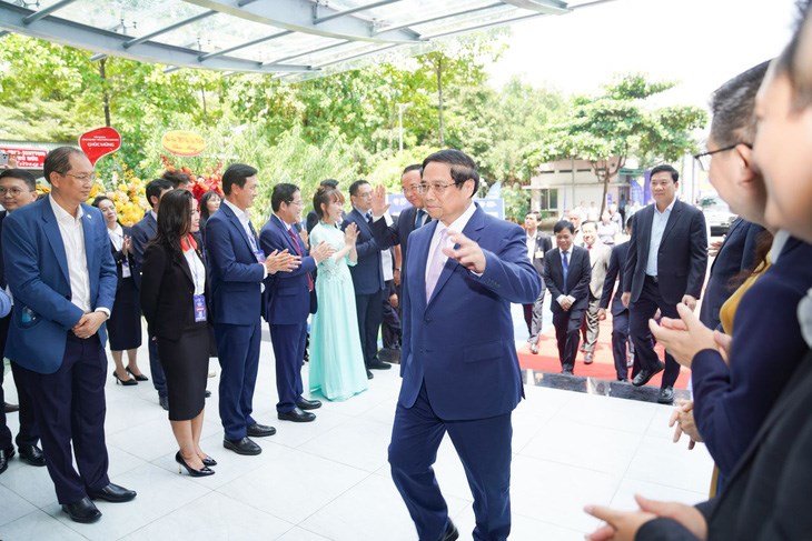 Thủ tướng Phạm Minh Ch&iacute;nh dự lễ kh&aacute;nh th&agrave;nh Trung t&acirc;m c&aacute;ch mạng c&ocirc;ng nghiệp 4.0 s&aacute;ng 25-9 - Ảnh: NGUYỄN QUANG
