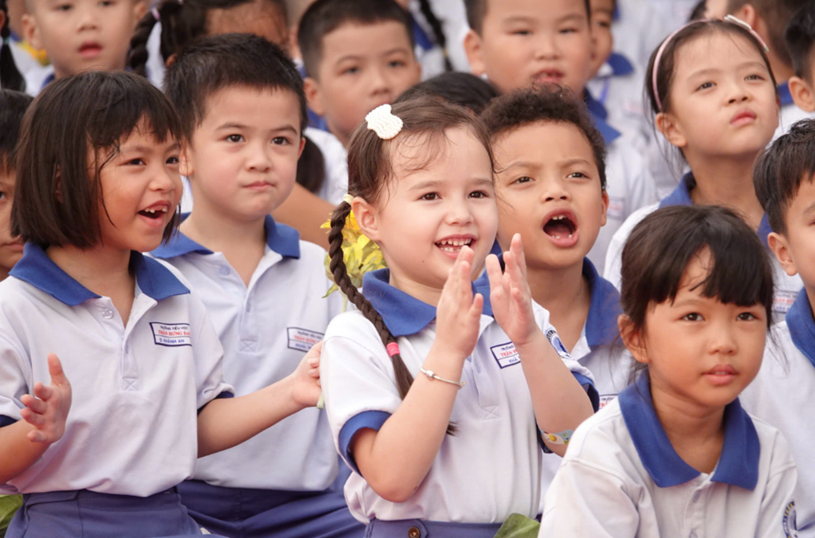 Nụ cười của những em học sinh Trường tiểu học Trần Hưng Đạo, Q.1 trong ngày khai giảng  ẢNH: ĐÀO NGỌC THẠCH