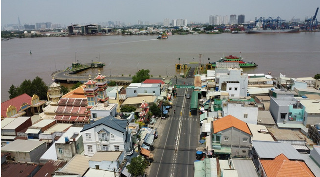 Huyện Nhơn Trạch (Đồng Nai) ngăn c&aacute;ch với Th&agrave;nh phố Hồ Ch&iacute; Minh bởi s&ocirc;ng Đồng Nai. (Ảnh: C&ocirc;ng Phong/TTXVN)