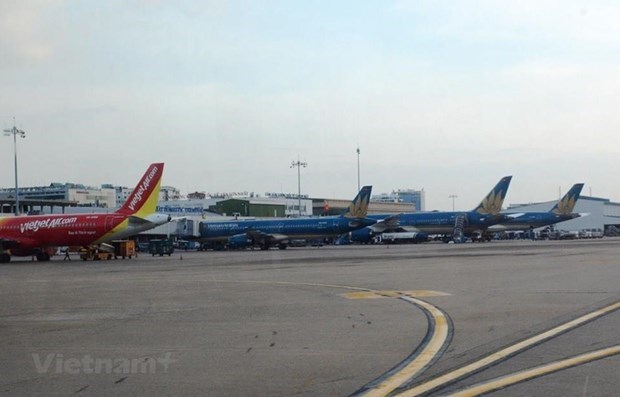 M&aacute;y bay của c&aacute;c h&atilde;ng h&agrave;ng kh&ocirc;ng Vietnam Airlines v&agrave; Vietjet. (Ảnh: Việt H&ugrave;ng/Vietnam+)