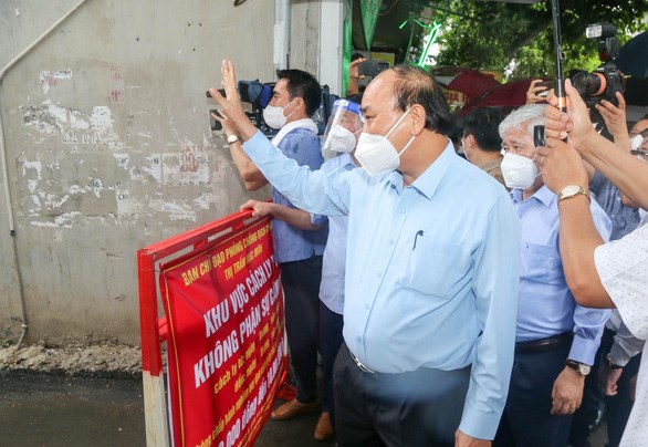 Chủ tịch nước Nguyễn Xu&#226;n Ph&#250;c: Thực hiện đồng bộ c&#225;c biện ph&#225;p để bảo vệ t&#237;nh mạng của người d&#226;n