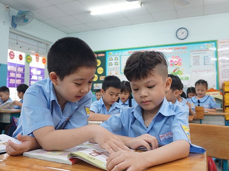 Học sinh Trường Tiểu học Triệu Thị Trinh, quận 10 trong một tiết học. Ảnh: NGUYỄN QUY&Ecirc;N